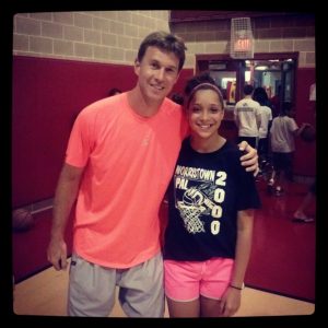 Matt Carroll from the Charlotte Bobcats working with 8th grade Camper Lauryn Hill at the Summer Shooting Clinic in July
